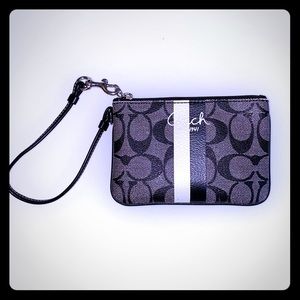 Black & white Coach wristlet